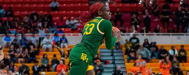 Aijha Blackwell looks to pass against OSU