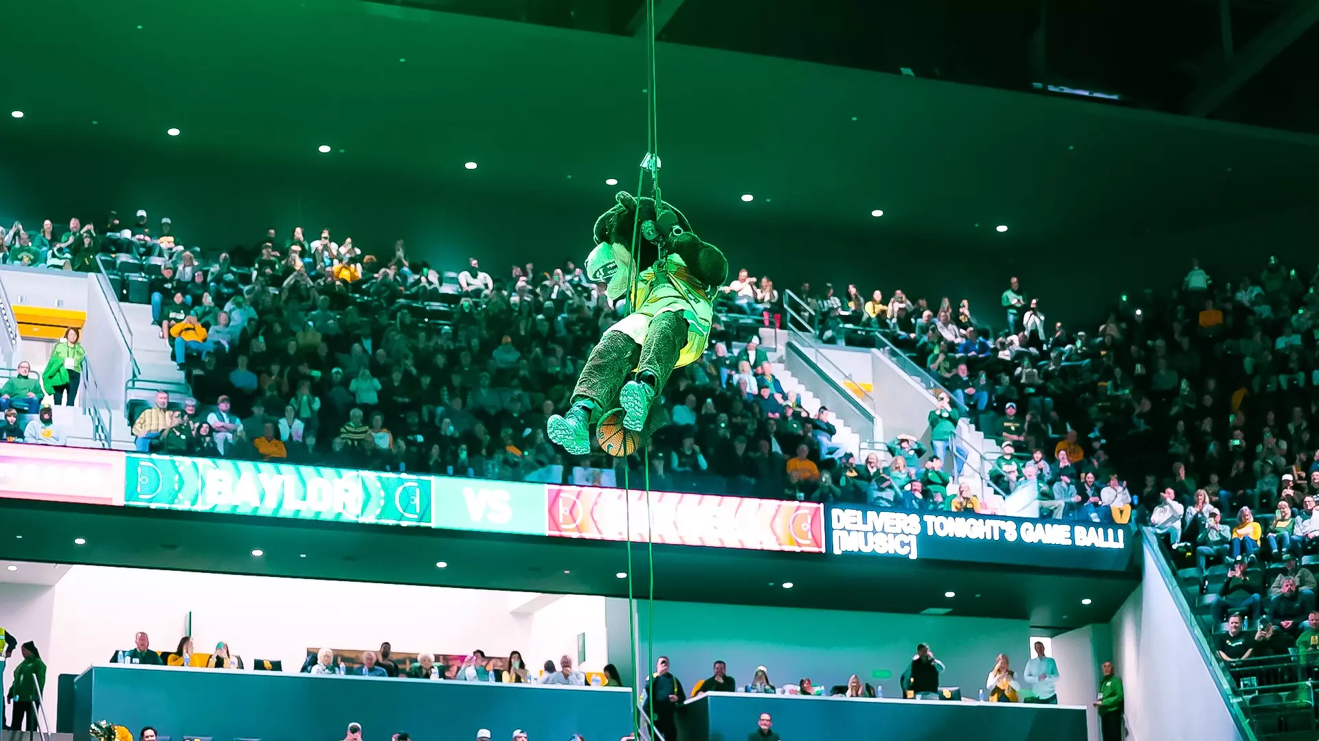 Inaugural Game - Bruiser delivers the game ball