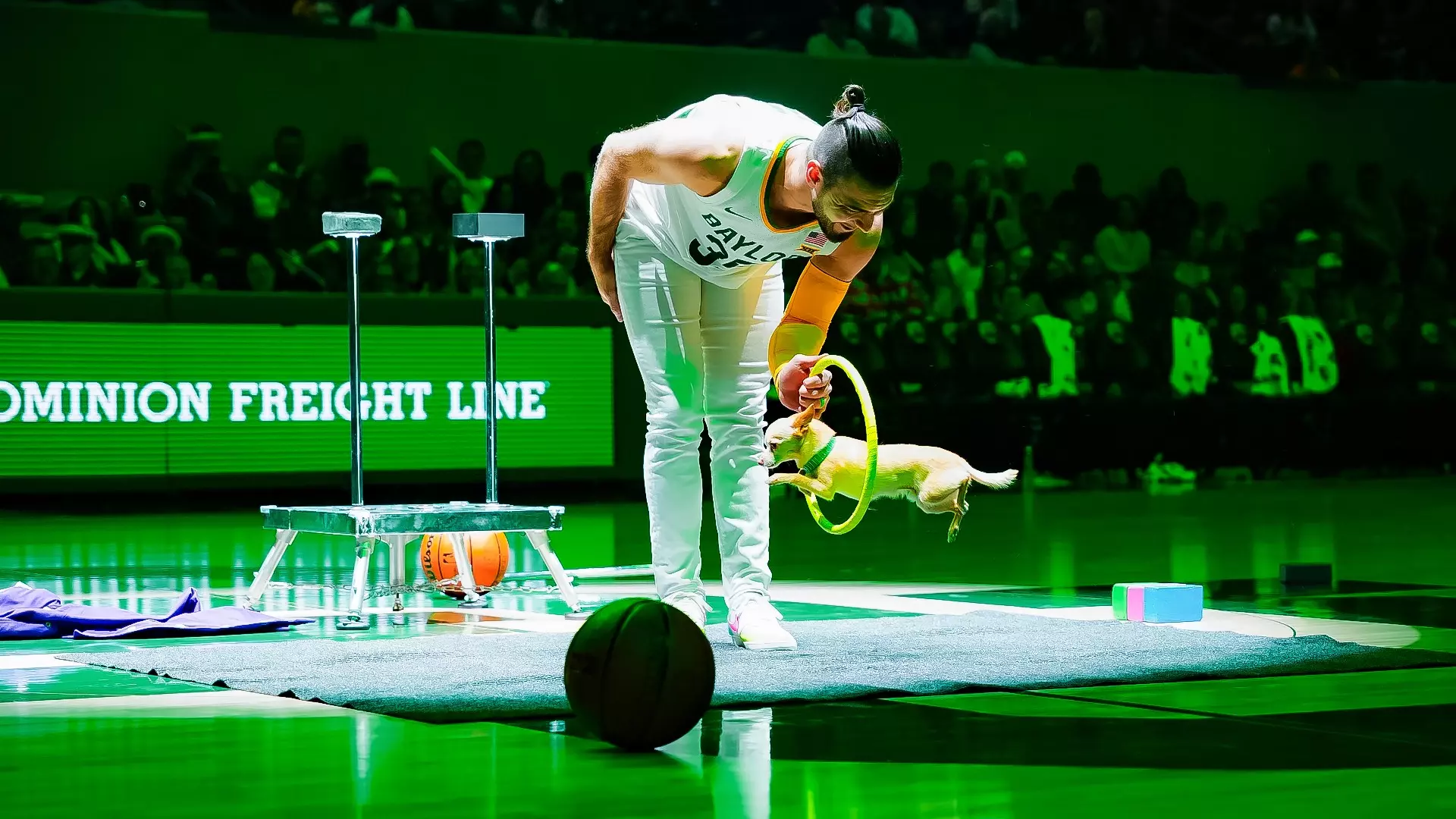 Inaugural Game - Christian & Scooby perform during a time out