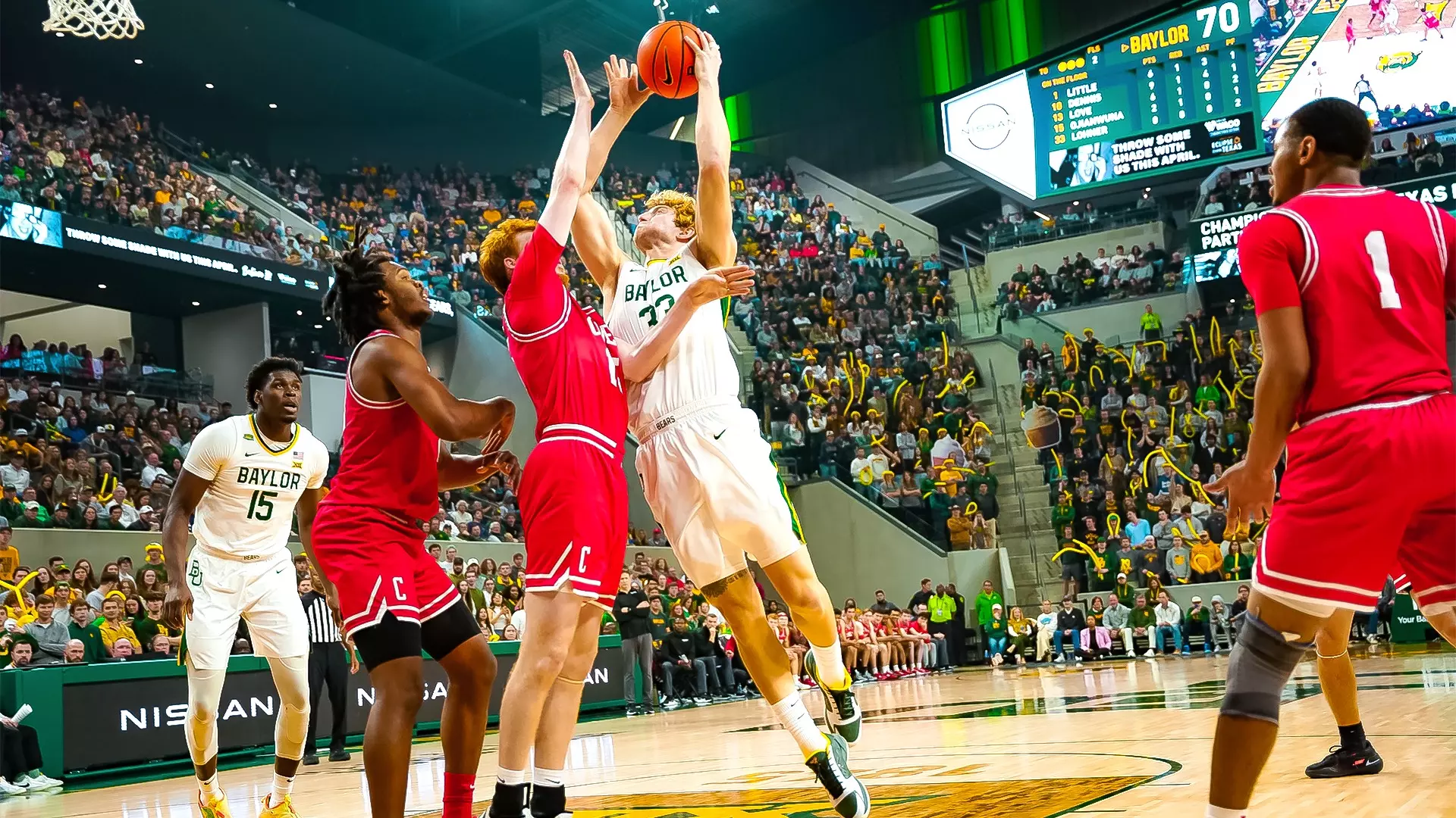 Inaugural Game - Caleb Lohner goes for the layup