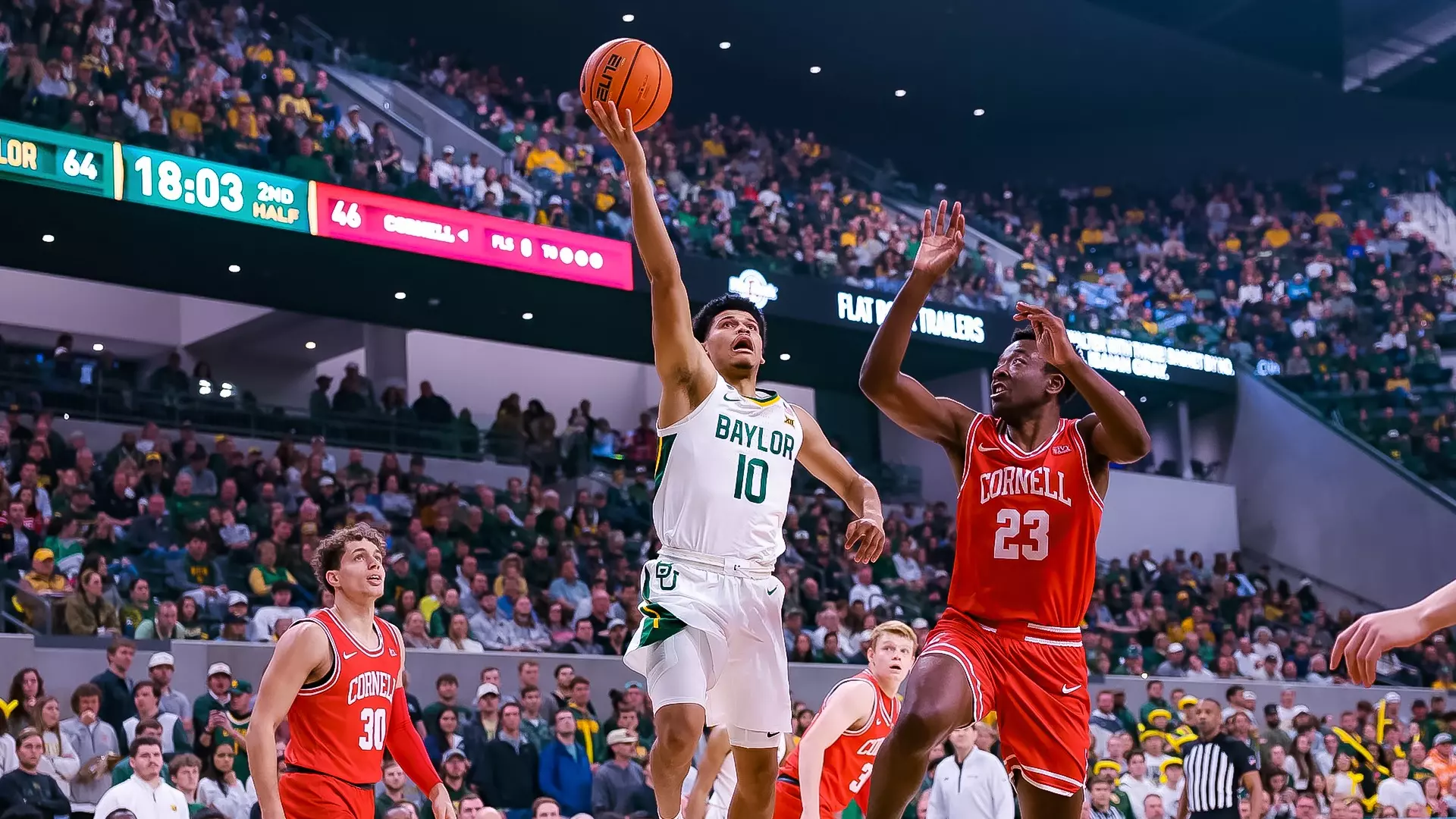Inaugural Game - RayJ Dennis goes for the layup