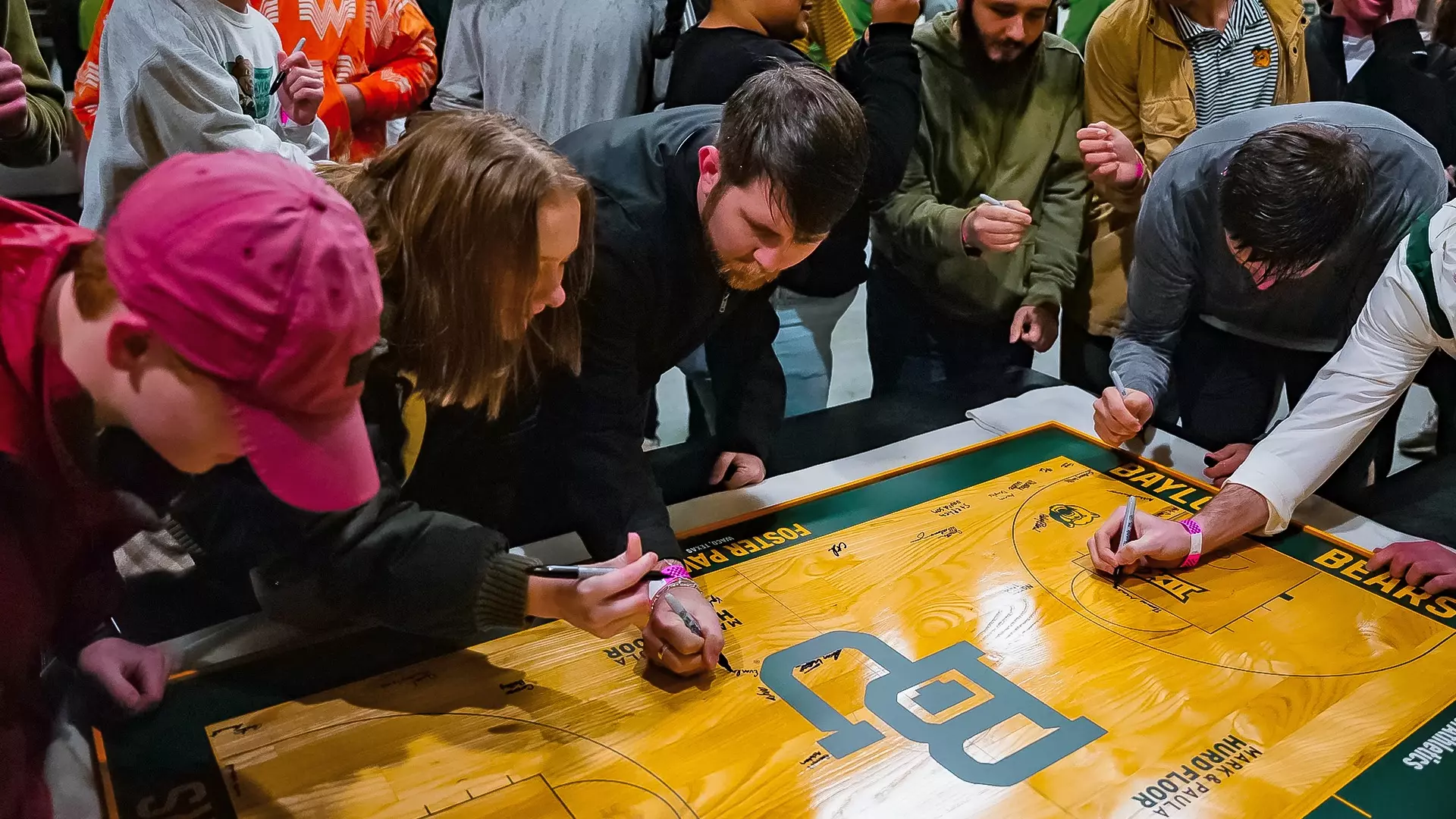 Inaugural Game - Students sign replica court