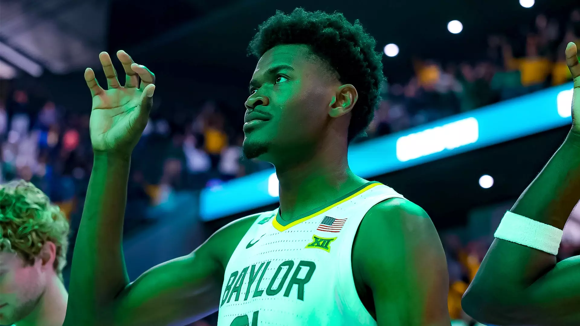 Inaugural Game - Yves Missi gives a sic 'em for the postgame alma mater
