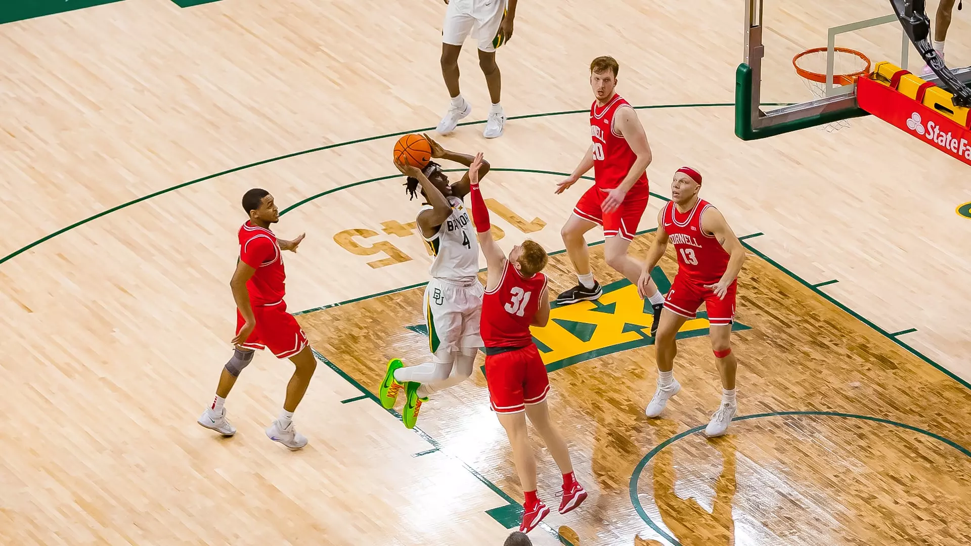 Inaugural Game - Ja'Kobe Walter goes up for the shot