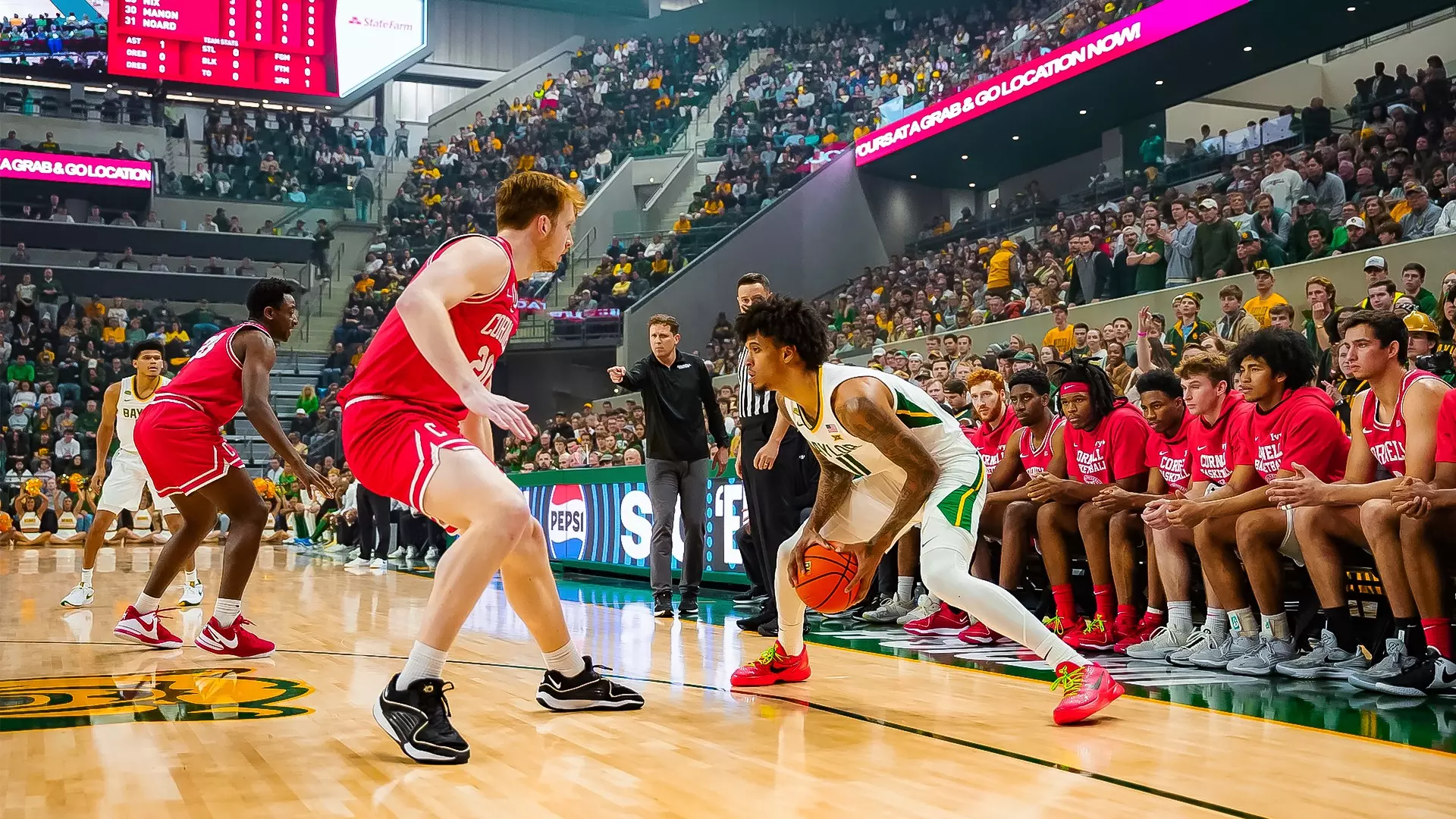 Inaugural Game - Jalen Bridges looks for an open man