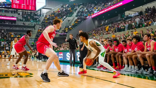 Inaugural Game - Jalen Bridges looks for an open man