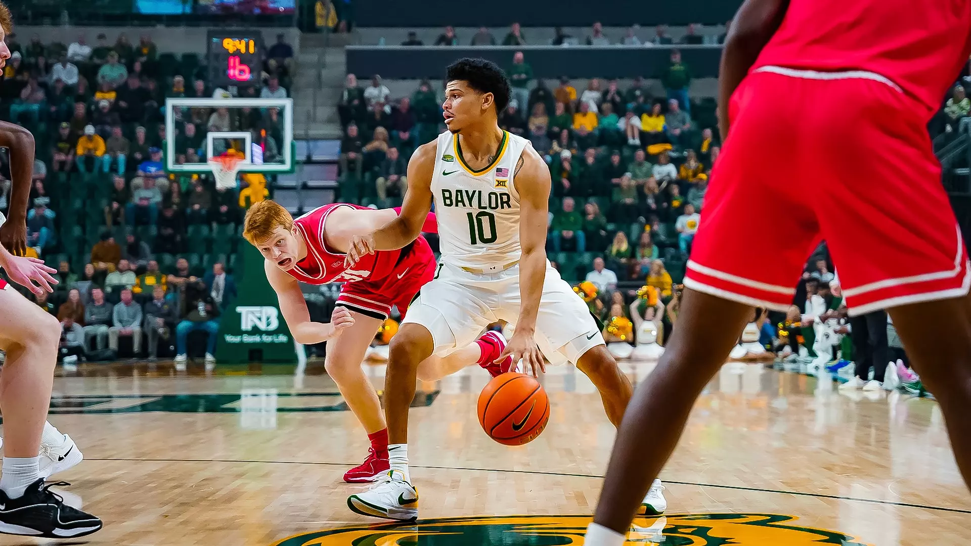 Inaugural Game - RayJ Dennis looks for the shot