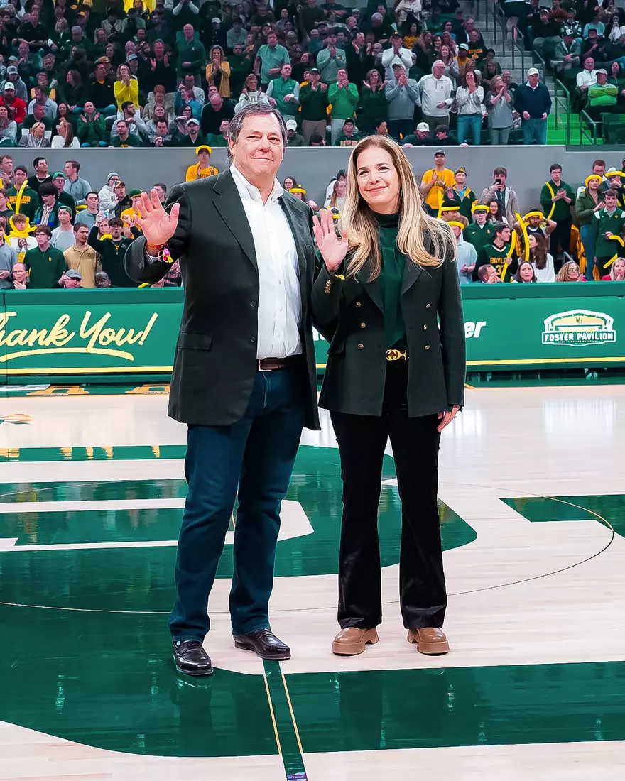 Inaugural Game - Paul & Alejandra Foster at halftime