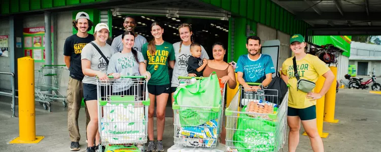 Costa Rica Mission Team helps a family purchase groceries