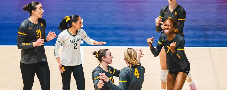 Victoria Davis, Jackie Barrett Frazier, Allie Sczech celebrate against WVU