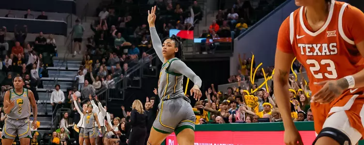 Bella Fontleroy shoots the three against Texas