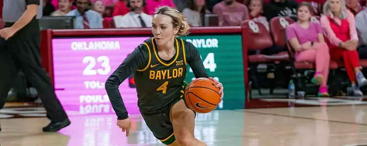 Jana Van Gytenbeek drives against Oklahoma