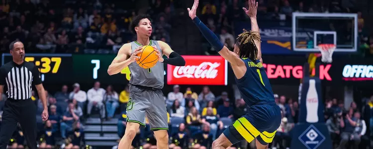 Miro Little looks to pass at West Virginia