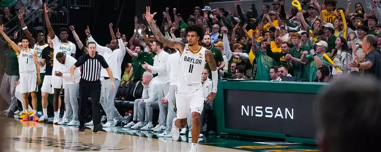 Jalen Bridges reacts to a deep three-pointer against Houston