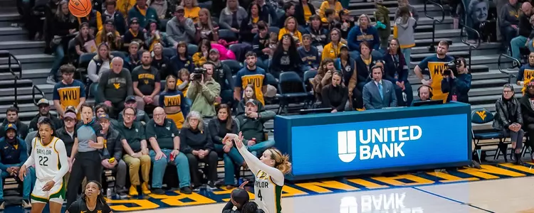 Jana Van Gytenbeek shoots a three against West Virginia