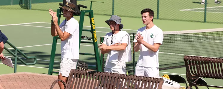 Justin Braverman and Ethan Muza cheering against SMU