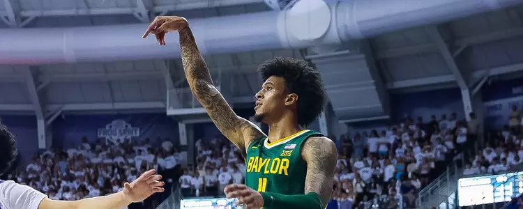 Jalen Bridges shoots a three at TCU