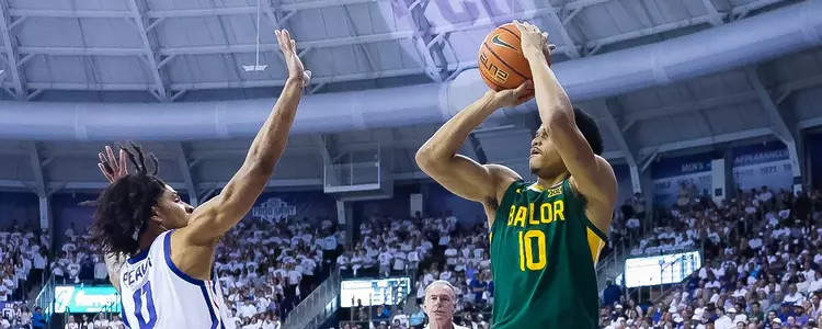 RayJ Dennis shoots against TCU