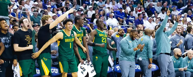 Bench celebrates against TCU
