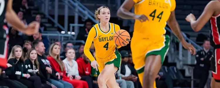Jana Van Gytenbeek looks to pass against Cincinnati