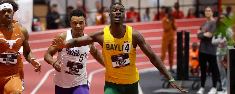 Nathaniel Ezekiel crossing finish at 2024 Big 12s 400m