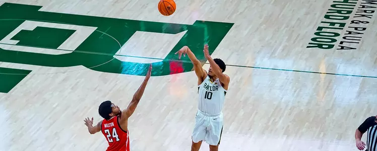 RayJ Dennis shoots against Texas Tech