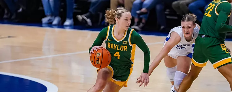 Jana Van Gytenbeek drives against BYU