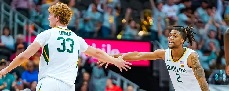 Caleb Lohner and Jayden Nunn slap hands against Cincinnati in the Big 12 Quarterfinals