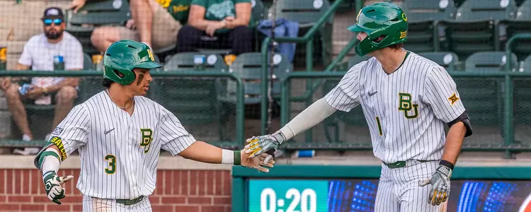 Enzo Apodaca and Will Pendergrass high five after Baylor defeats ORU 2024