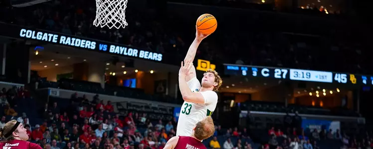 Caleb Lohner gets a jumper against Colgate