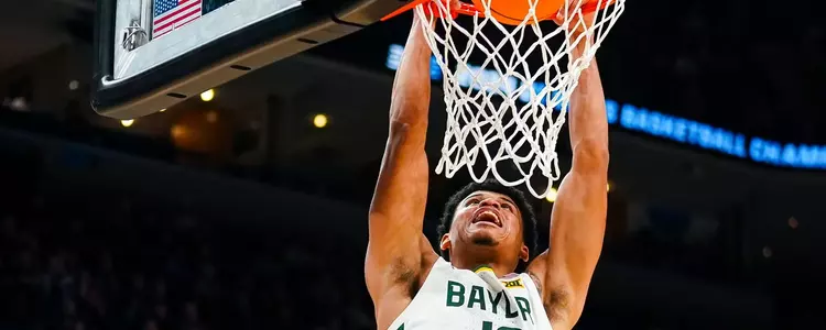RayJ Dennis dunks against Colgate
