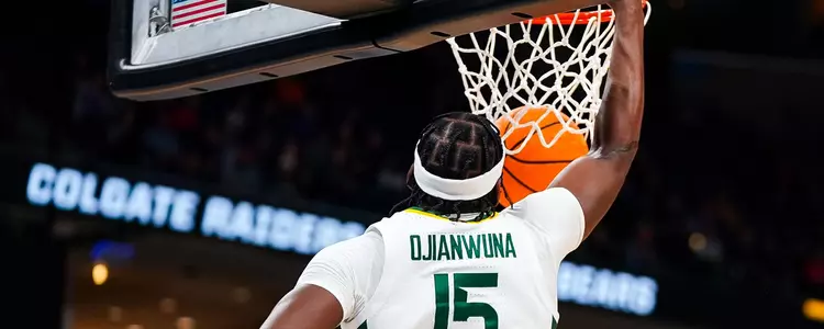 Joshua Ojianwuna dunks against Colgate
