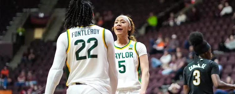 Darianna Littlepage-Buggs celebrates with Bella Fontleroy against Vanderbilt