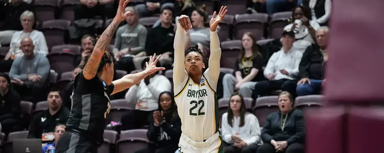 Bella Fontleroy shoots the three against Vanderbilt