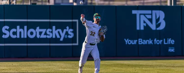 Caleb Bergman throwing a ball from the outfield vs UTSA 2024