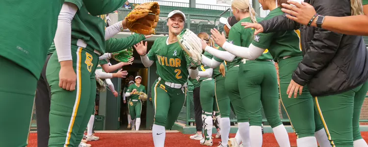 Taylor Strain running through pregame tunnel