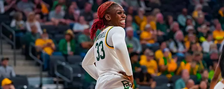 Aijha Blackwell smiles against Oklahoma State