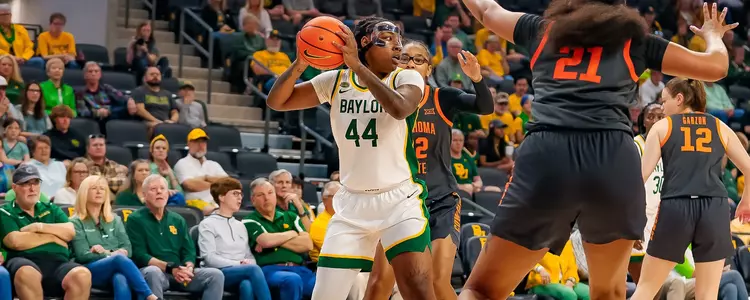 Dre'Una Edwards looks to pass against Oklahoma State