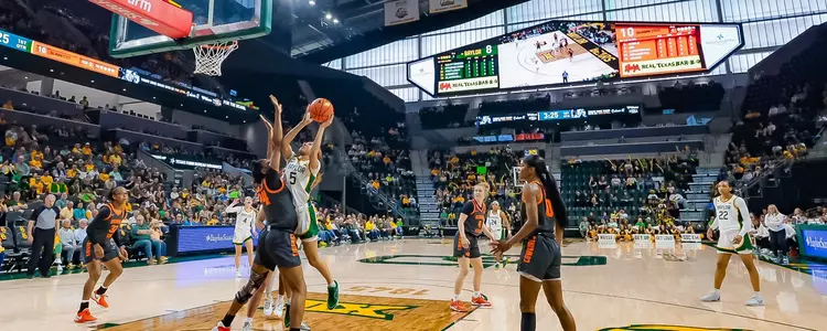Darianna Littlepage-Buggs gets a shot off against Oklahoma State