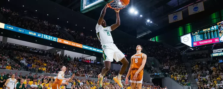 Josh Ojianwuna dunks on Texas