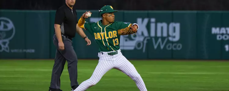 Tyriq Kemp readies to throw after fielding a ground ball vs DBU 2024