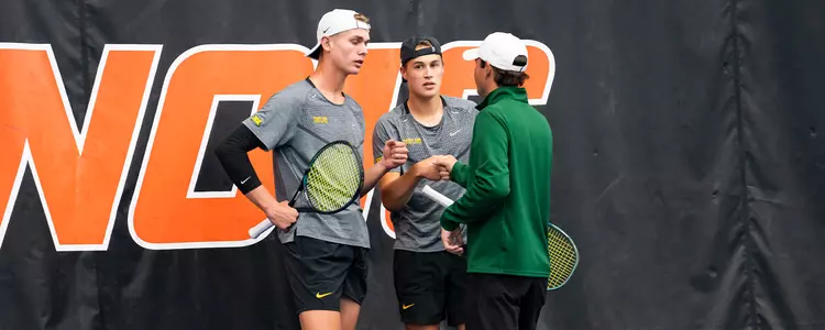 Devin Badenhorst, Luc Koenig and Michael Woodson during doubles at Illinois 2024