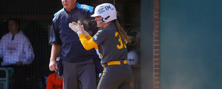 Caroline Rowatt celebrating after scoring against Oklahoma State