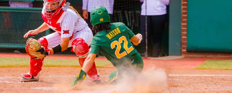 Ana Watson sliding into home against Texas Tech