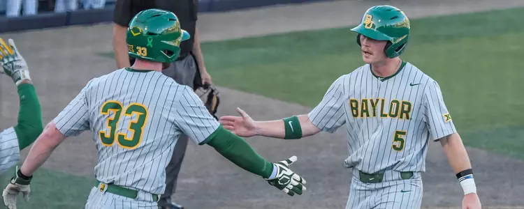 Danny Altman and Wesley Jordan high five at BYU 2024