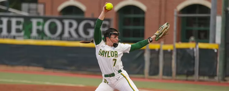 Kaci West pitching against UTA