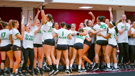 BU celebrates after toss