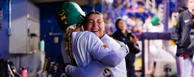 Emily Hott and Ashlyn Wachtendorf celebrate after grand slam against BYU