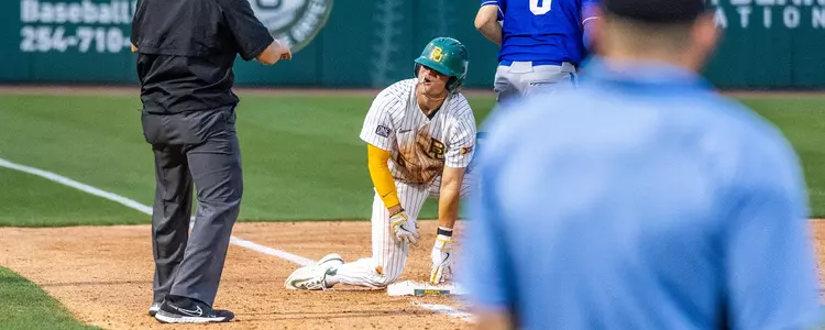 Cole Posey slides in at third base after hitting a triple vs UTA 2024