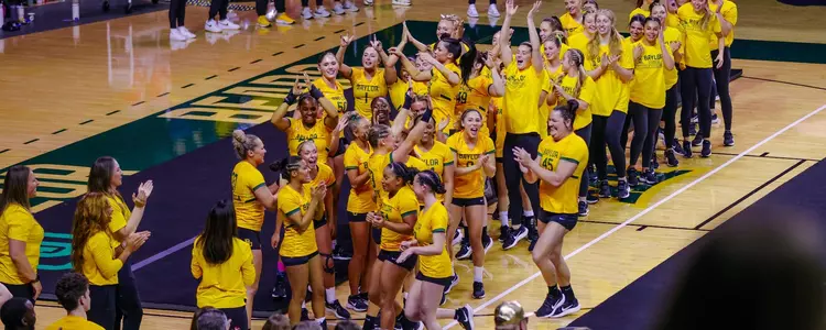 BU celebrates against Oregon after a pyramid heat